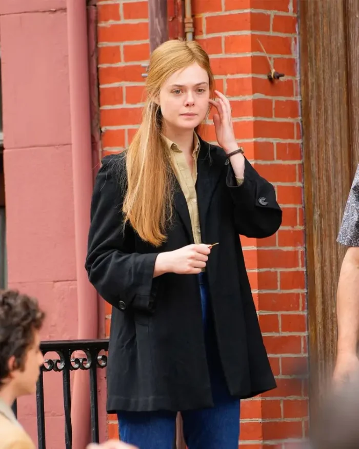 A Complete Unknown Elle Fanning Black Trench Coat Front Look 2