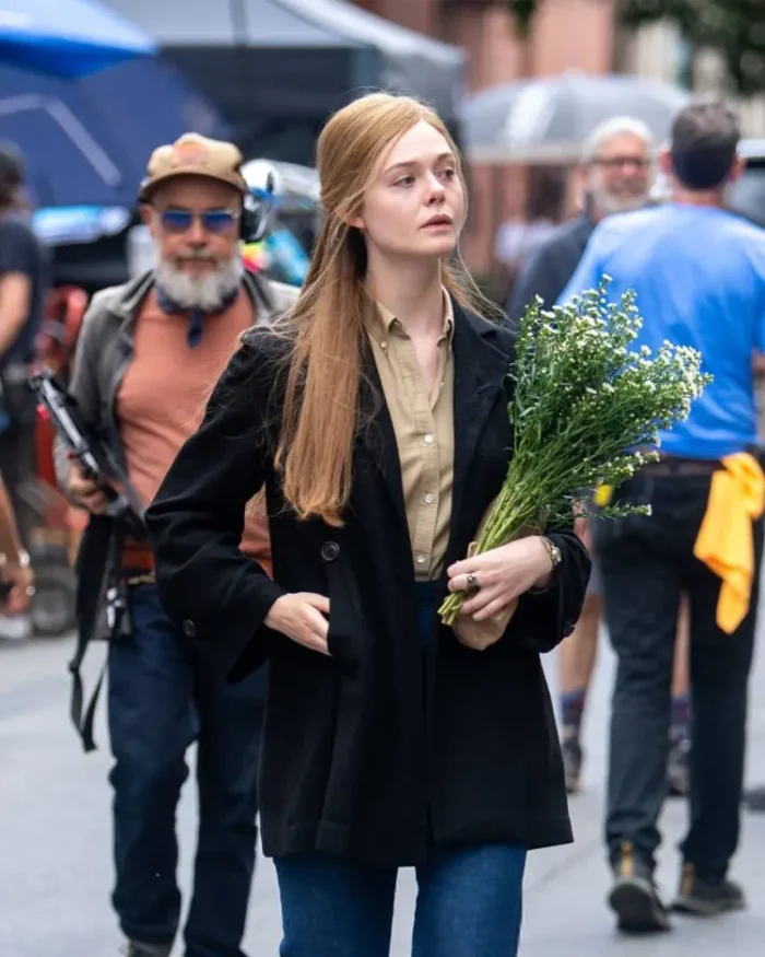 A Complete Unknown Elle Fanning Black Trench Coat Hand In Pocket Look