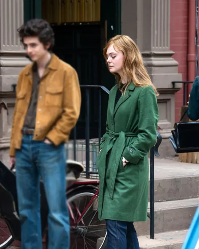 A Complete Unknown Elle Fanning Green Long Coat Side View