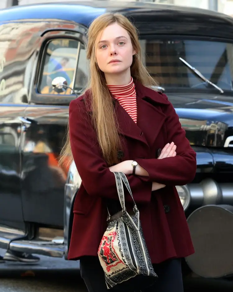 A Complete Unknown Elle Fanning Red Coat Front Look