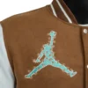 Travis Scott X Jordan Brown Varsity Jacket Front Logo Closure