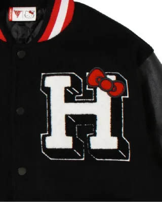 HELLO KITTY APPLES VARSITY JACKET Black close up view