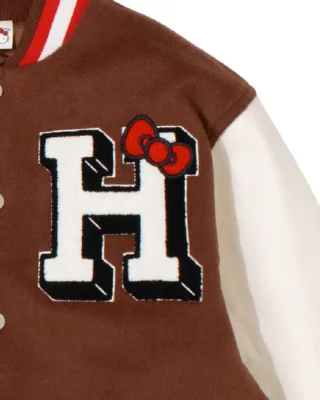 HELLO KITTY APPLES VARSITY JACKET Brown close up view