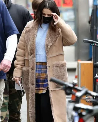 mabel mora only murders in the building shearling coat open closure