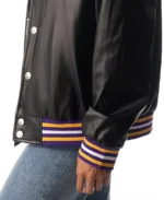 The Wild Collective Minnesota Vikings Black Snap Bomber Jacket Cuff and Hemline Closeup - Trendy Leather Jackets