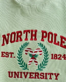 Shop North Pole University Christmas Candy Sweatshirt For Women On Sale - Trendy Leather Jackets